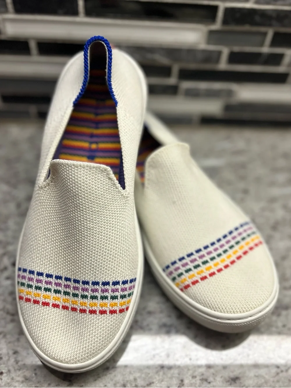 Rothy's children’s Off-White Slip-On Sneakers with Rainbow Stitching size 2